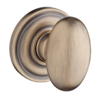 Baldwin Privacy Door Knob with Traditional Round Rose in Matte Brass & Black