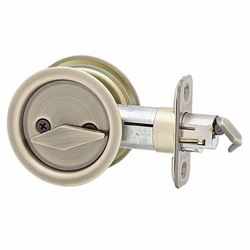 Kwikset Door Hardware Pocket Door Locks Round Privacy Pocket Door Lock in Antique Brass