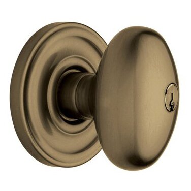 Baldwin Keyed Entry Door Knob with Classic Rose in Satin Brass & Black