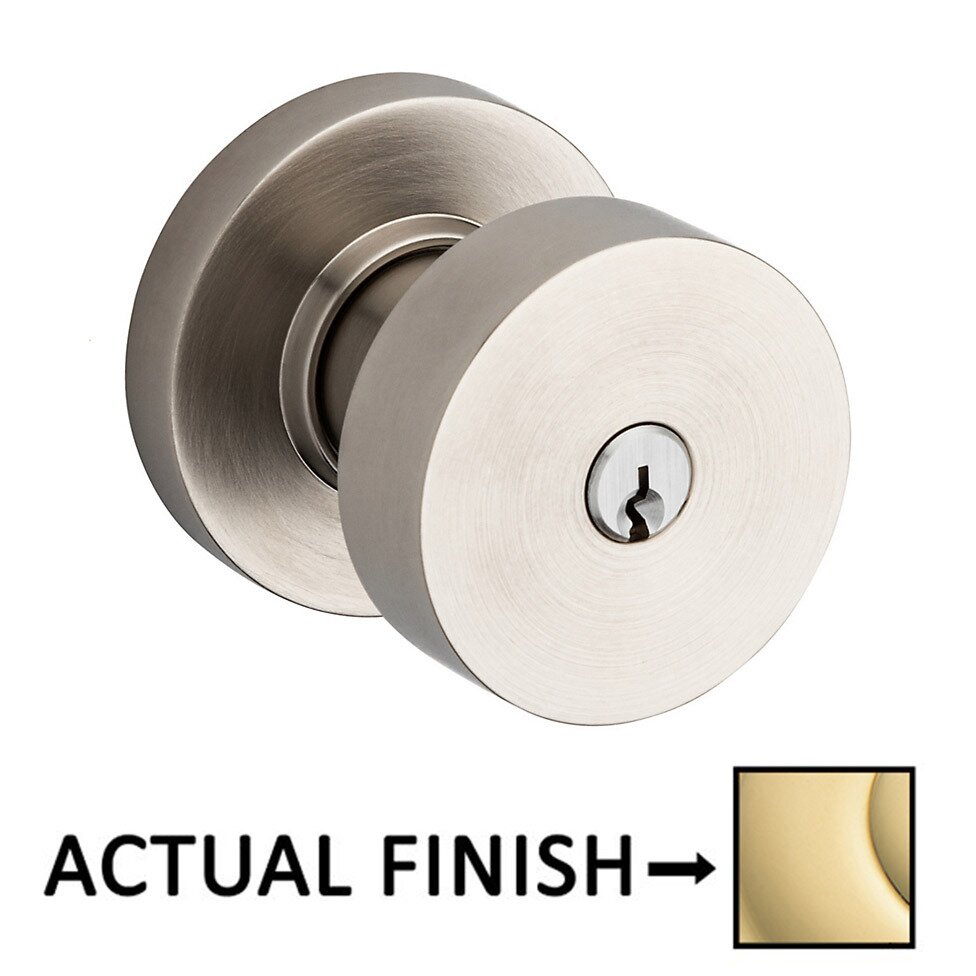 Baldwin Keyed Contemporary Knob with Round Rose in Unlacquered Brass