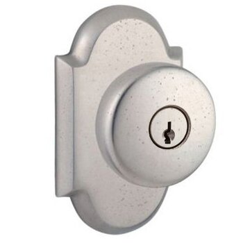 Baldwin Keyed Entry Door Knob with Arch Rose in White Bronze