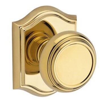 Baldwin Full Dummy Door Knob with Arch Rose in Polished Brass