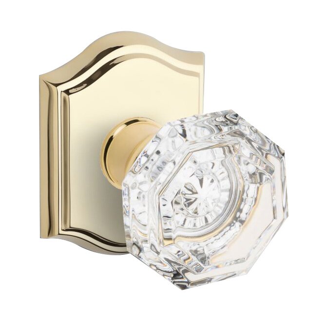 Baldwin Passage Crystal Door Knob with Traditional Arch Rose in Polished Brass