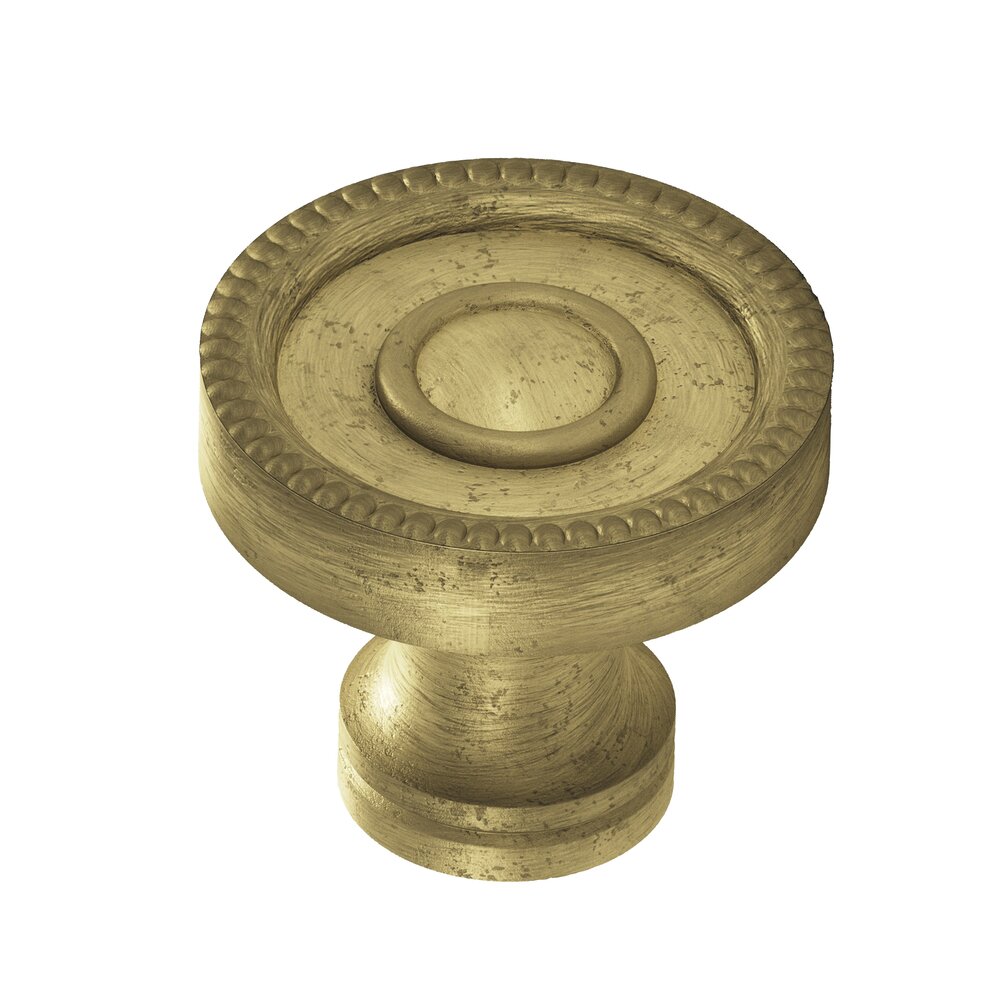 Colonial Bronze 1 1/4" Diameter Knob in Distressed Antique Brass
