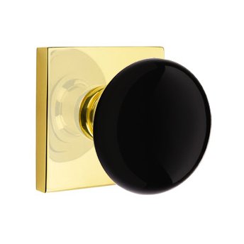 Emtek Passage Ebony Knob And Modern Square Rosette With Concealed Screws in Unlacquered Brass