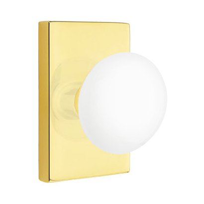 Emtek Passage Ice White Knob And Modern Rectangular Rosette With Concealed Screws in Unlacquered Brass