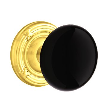 Emtek Passage Ebony Knob And Ribbon & Reed Rosette With Concealed Screws  in Unlacquered Brass