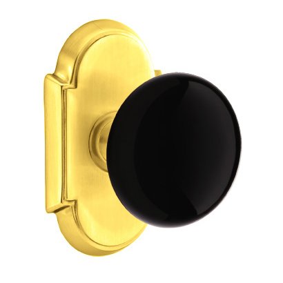Emtek Passage Ebony Knob And #8 Rosette With Concealed Screws in Unlacquered Brass