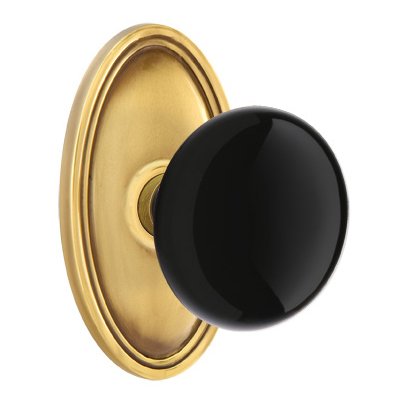 Emtek Passage Ebony Knob And Oval Rosette With Concealed Screws in French Antique Brass