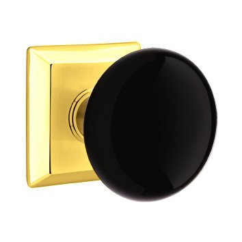 Emtek Passage Ebony Knob And Quincy Rosette With Concealed Screws in Polished Brass