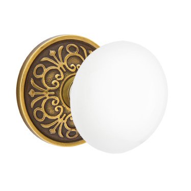 Emtek Privacy Ice White Knob And Lancaster Rosette With Concealed Screws  in French Antique Brass