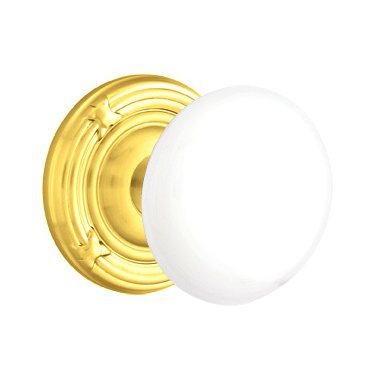 Emtek Privacy Ice White Porcelain Knob With Ribbon & Reed Rosette  in Unlacquered Brass