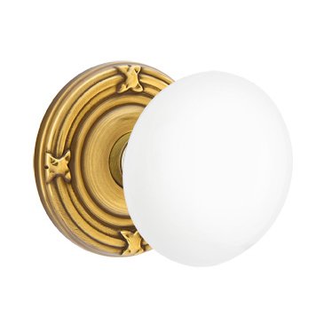 Emtek Privacy Ice White Porcelain Knob With Ribbon & Reed Rosette  in French Antique Brass