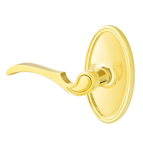 Emtek Privacy Left Handed Coventry Lever With Oval Rose in Unlacquered Brass
