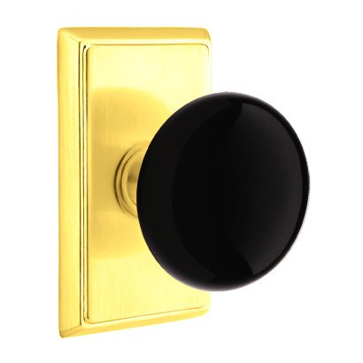 Emtek Privacy Ebony Knob And Rectangular Rosette With Concealed Screws in Unlacquered Brass