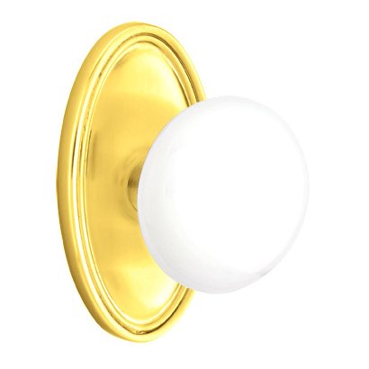 Emtek Single Dummy Ice White Porcelain Knob With Oval Rosette in Unlacquered Brass