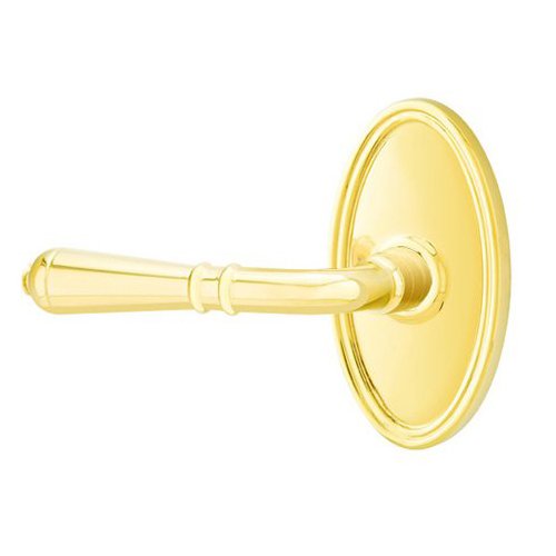 Emtek Double Dummy Left Handed Turino Door Lever With Oval Rose in Unlacquered Brass