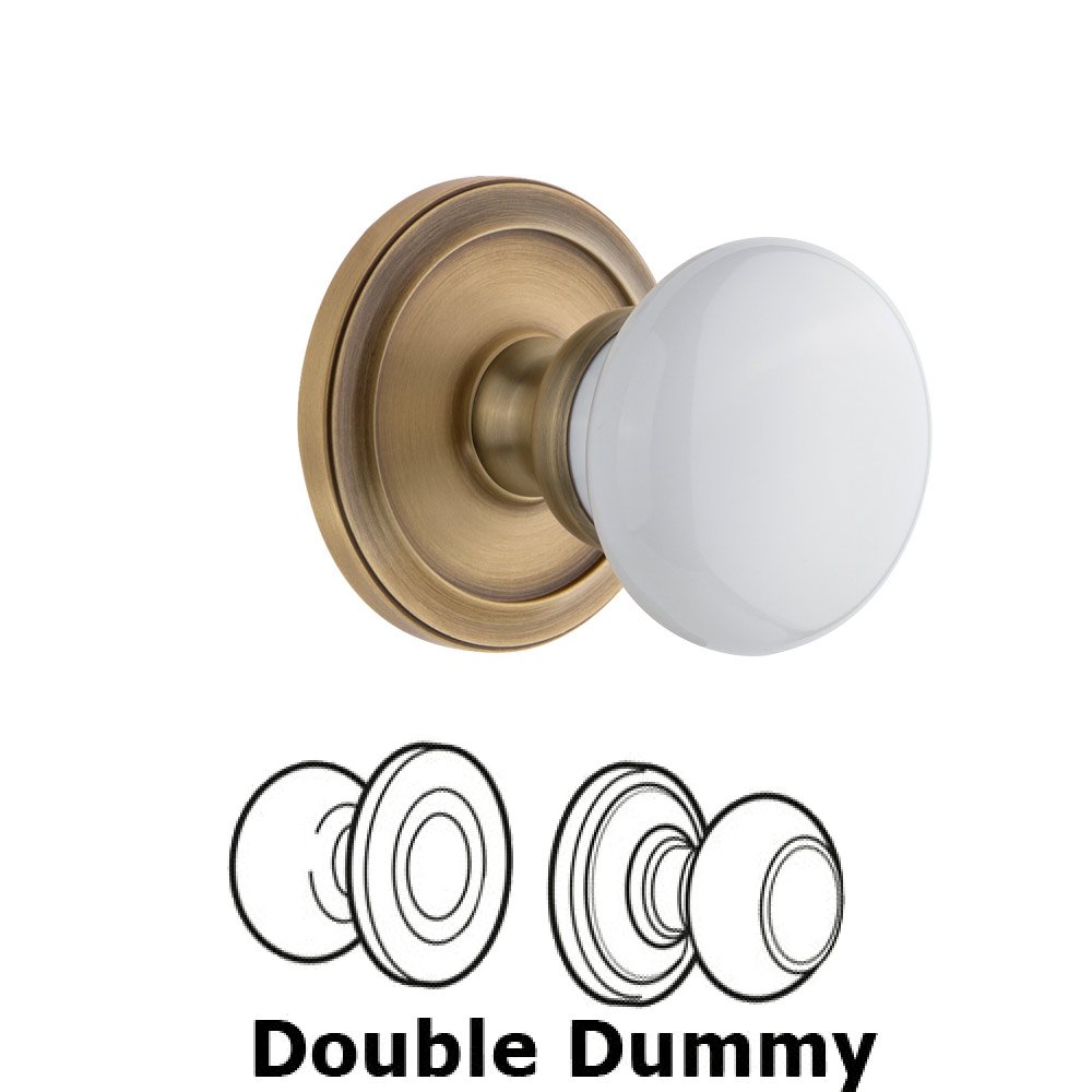 Grandeur Circulaire Rosette Double Dummy with Hyde Park White Porcelain Knob in Vintage Brass