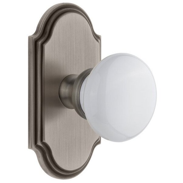 Grandeur Arc Plate Dummy with Hyde Park White Porcelain Knob in Antique Pewter