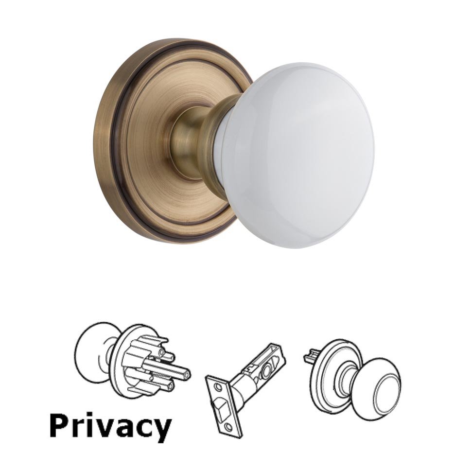 Grandeur Georgetown Plate Privacy with Hyde Park White Porcelain Knob in Vintage Brass