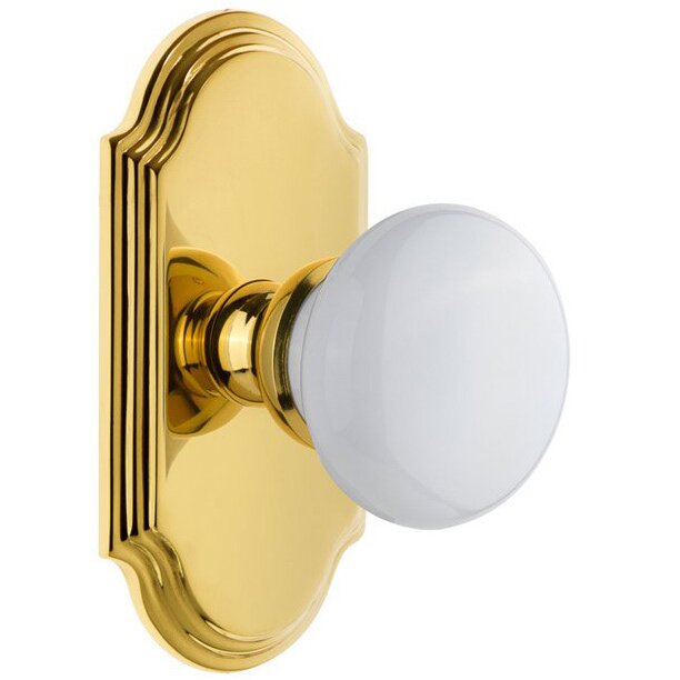 Grandeur Arc Plate Privacy with Hyde Park White Porcelain Knob in Lifetime Brass