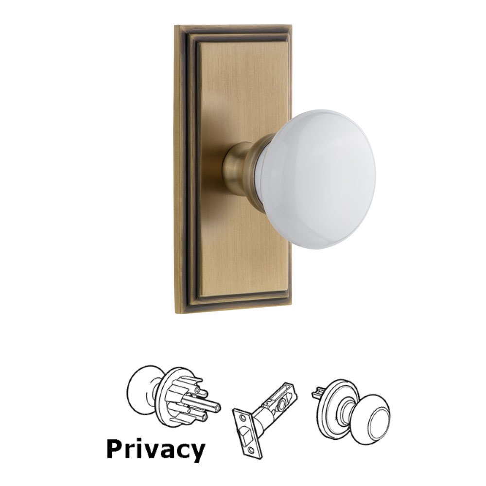 Grandeur Carre Plate Privacy with Hyde Park White Porcelain Knob in Vintage Brass