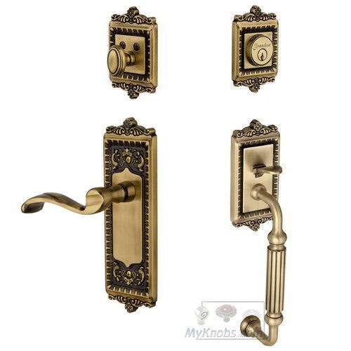 Grandeur Windsor with "F" Grip and Portofino Left Handed Door Lever in Vintage Brass