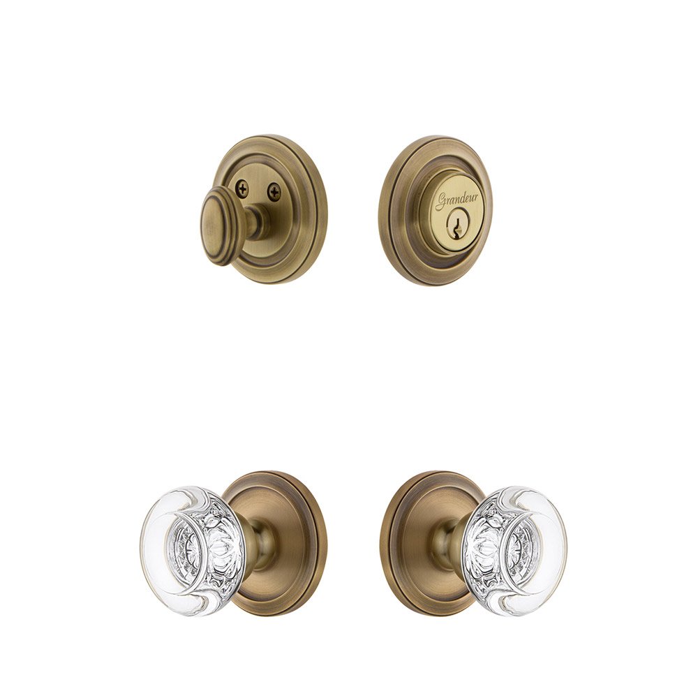 Grandeur Handleset - Circulaire Rosette With Bordeaux Crystal Knob & Matching Deadbolt In Vintage Brass