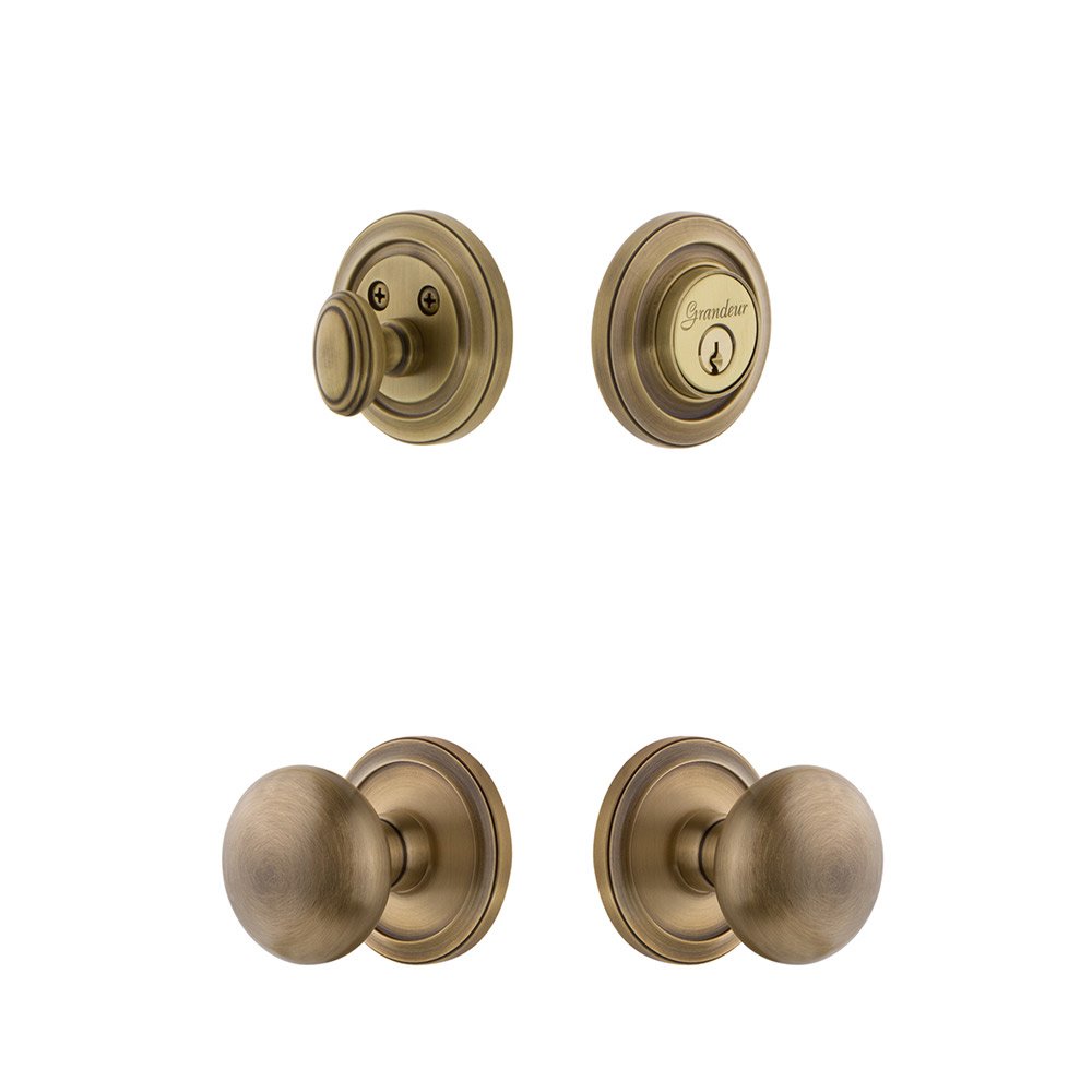 Grandeur Handleset - Circulaire Rosette With Fifth Avenue Knob & Matching Deadbolt In Vintage Brass