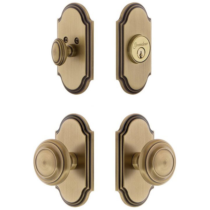 Grandeur Handleset - Arc Plate With Circulaire Knob & Matching Deadbolt In Vintage Brass