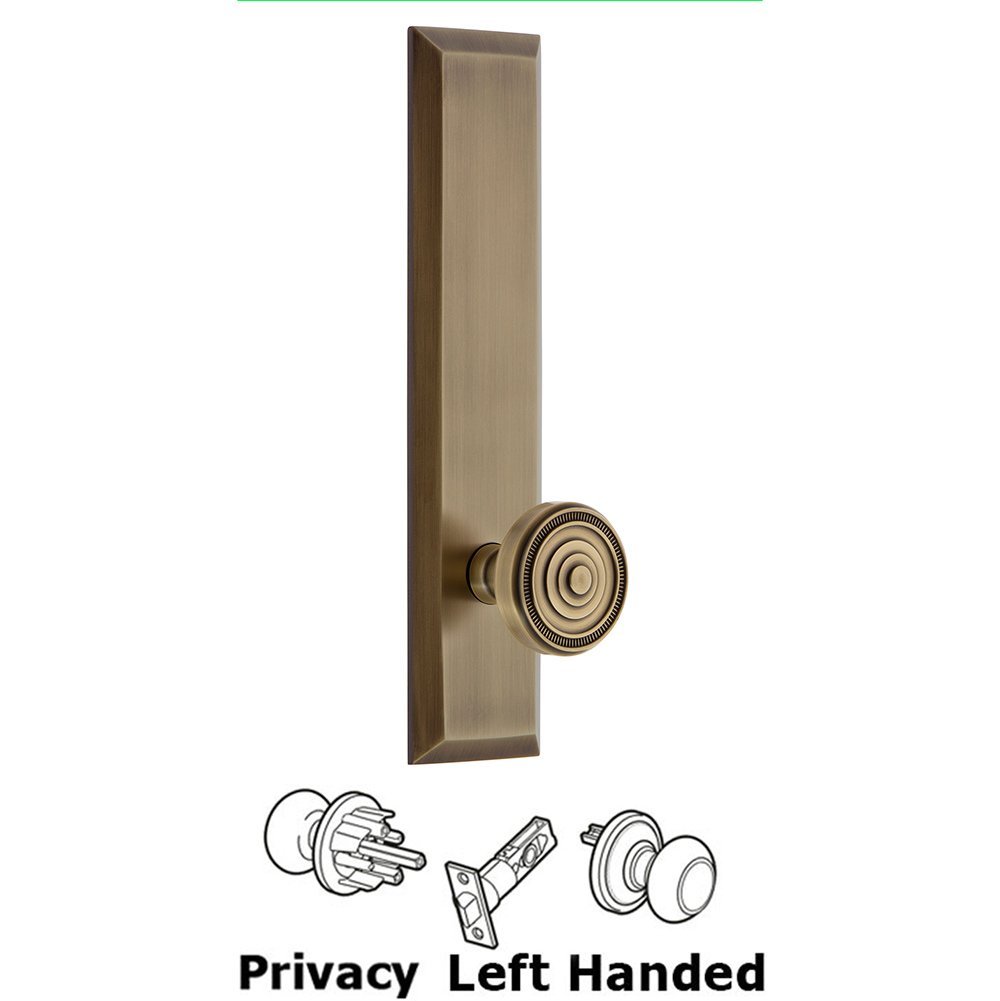 Grandeur Privacy Fifth Avenue Tall Plate with Soleil Left Handed Knob in Vintage Brass