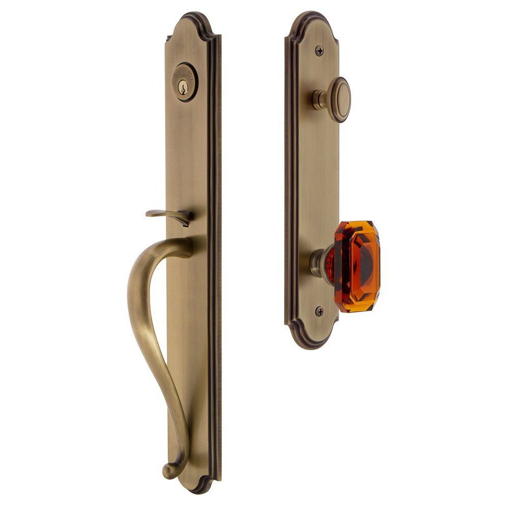 Grandeur Arc One-Piece Handleset with S Grip and Baguette Amber Knob in Vintage Brass