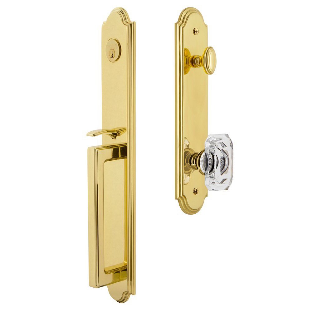 Grandeur Arc One-Piece Handleset with D Grip and Baguette Clear Crystal Knob in Lifetime Brass