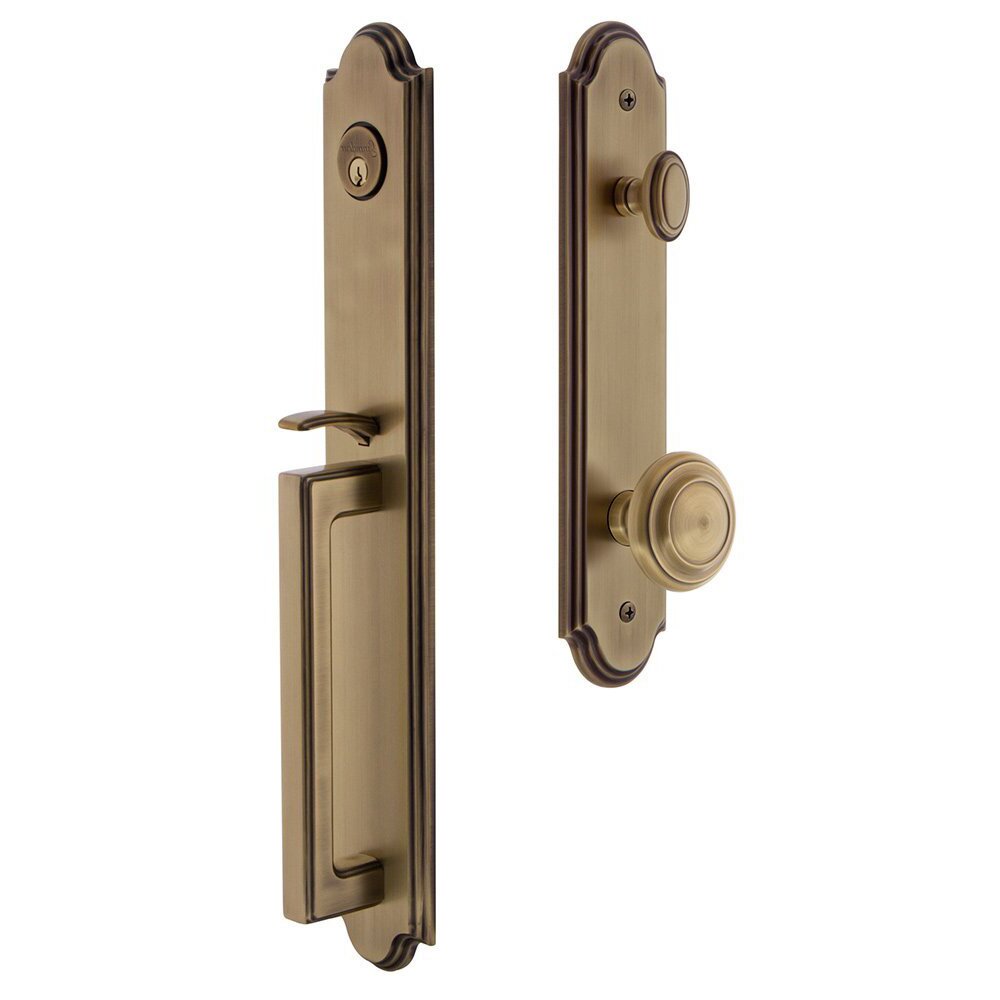 Grandeur Arc One-Piece Handleset with D Grip and Circulaire Knob in Vintage Brass