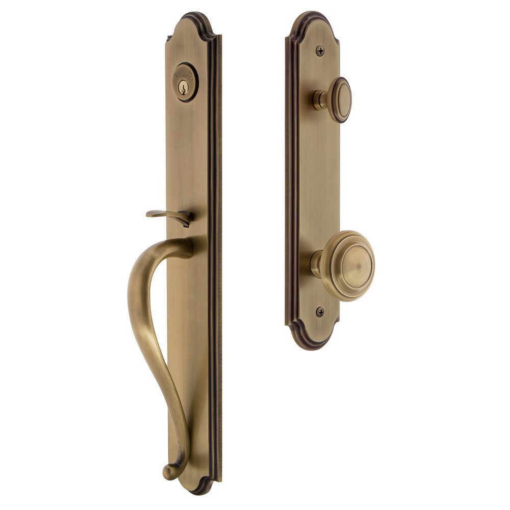Grandeur Arc One-Piece Handleset with S Grip and Circulaire Knob in Vintage Brass