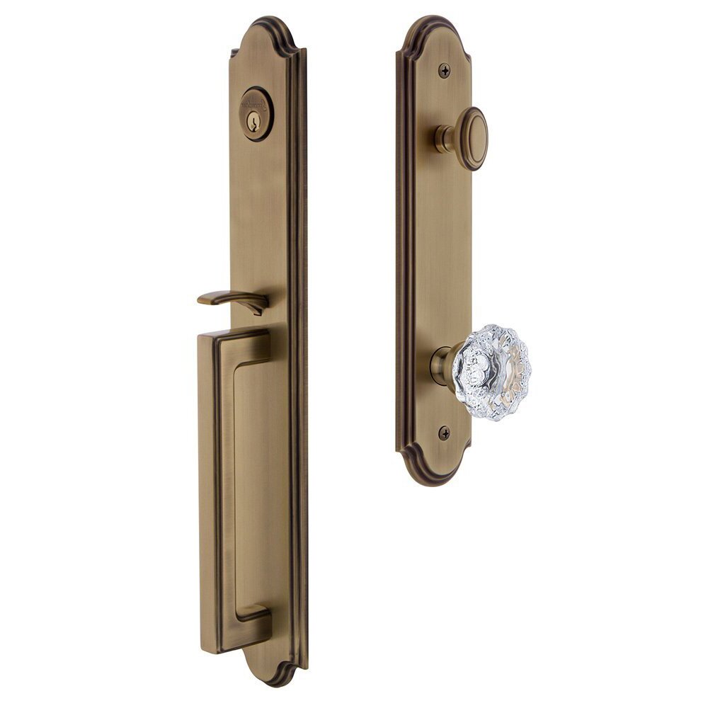 Grandeur Arc One-Piece Handleset with D Grip and Fontainebleau Knob in Vintage Brass