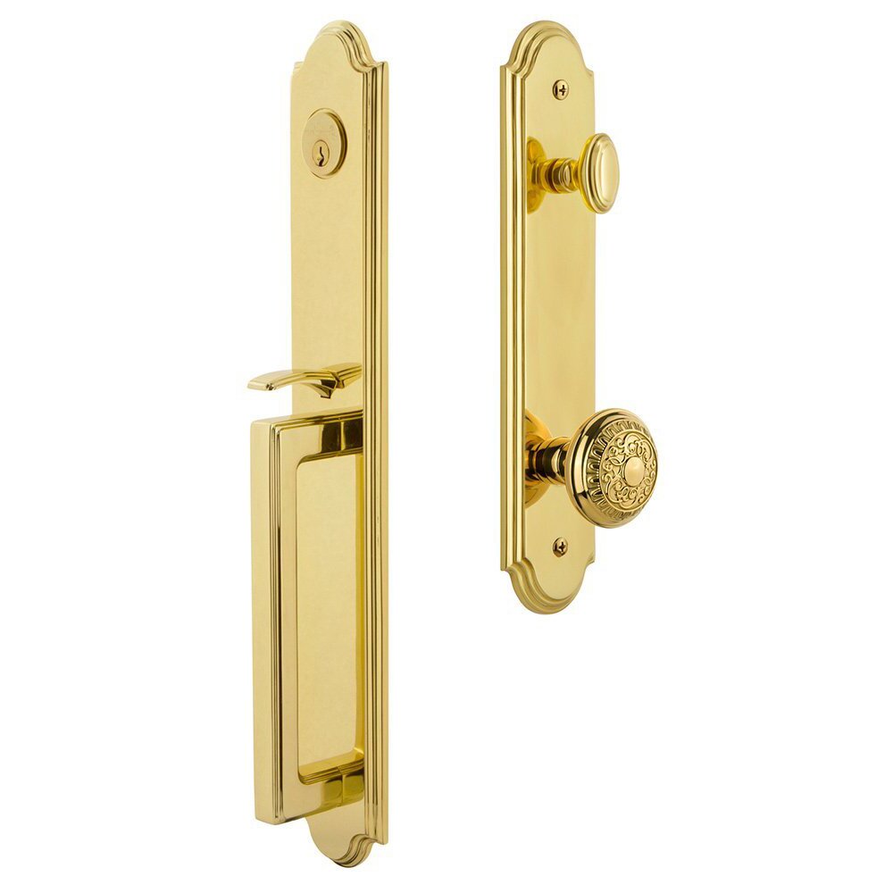 Grandeur Arc One-Piece Handleset with D Grip and Windsor Knob in Lifetime Brass