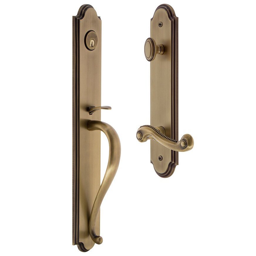 Grandeur Arc One-Piece Handleset with S Grip and Newport Left Handed Lever in Vintage Brass