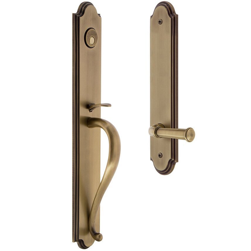 Grandeur Arc One-Piece Dummy Handleset with S Grip and Georgetown Left Handed Lever in Vintage Brass