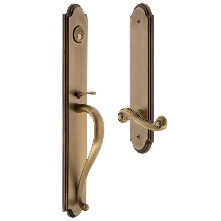 Grandeur Arc One-Piece Dummy Handleset with S Grip and Newport Left Handed Lever in Vintage Brass