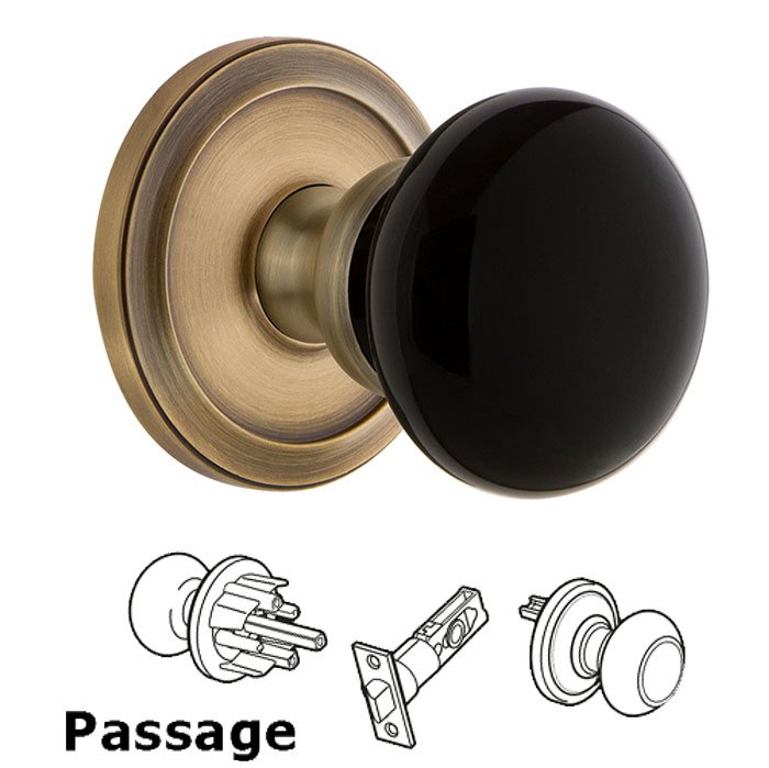 Grandeur Passage - Circulaire Rosette with Black Coventry Porcelain Knob in Vintage Brass