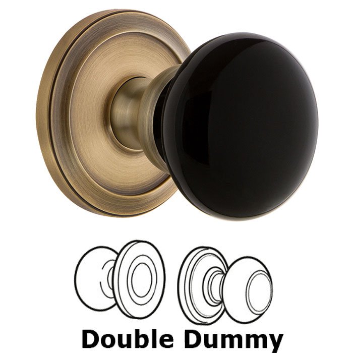 Grandeur Double Dummy - Circulaire Rosette with Black Coventry Porcelain Knob in Vintage Brass