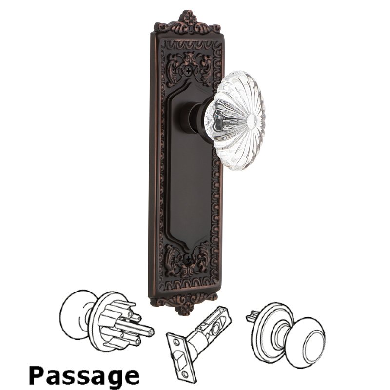Nostalgic Warehouse Passage Egg & Dart Plate with Oval Fluted Crystal Glass Door Knob in Timeless Bronze