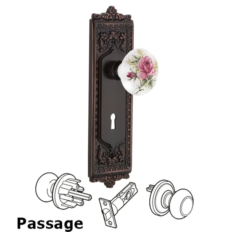 Nostalgic Warehouse Passage Egg & Dart Plate with Keyhole and White Rose Porcelain Door Knob in Timeless Bronze