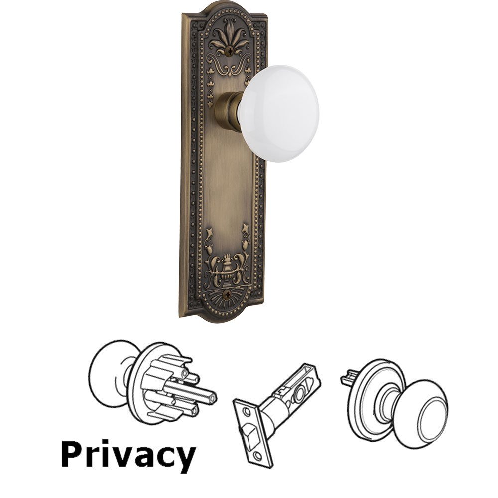 Nostalgic Warehouse Privacy Knob - Meadows Plate with White Porcelain Knob in Antique Brass