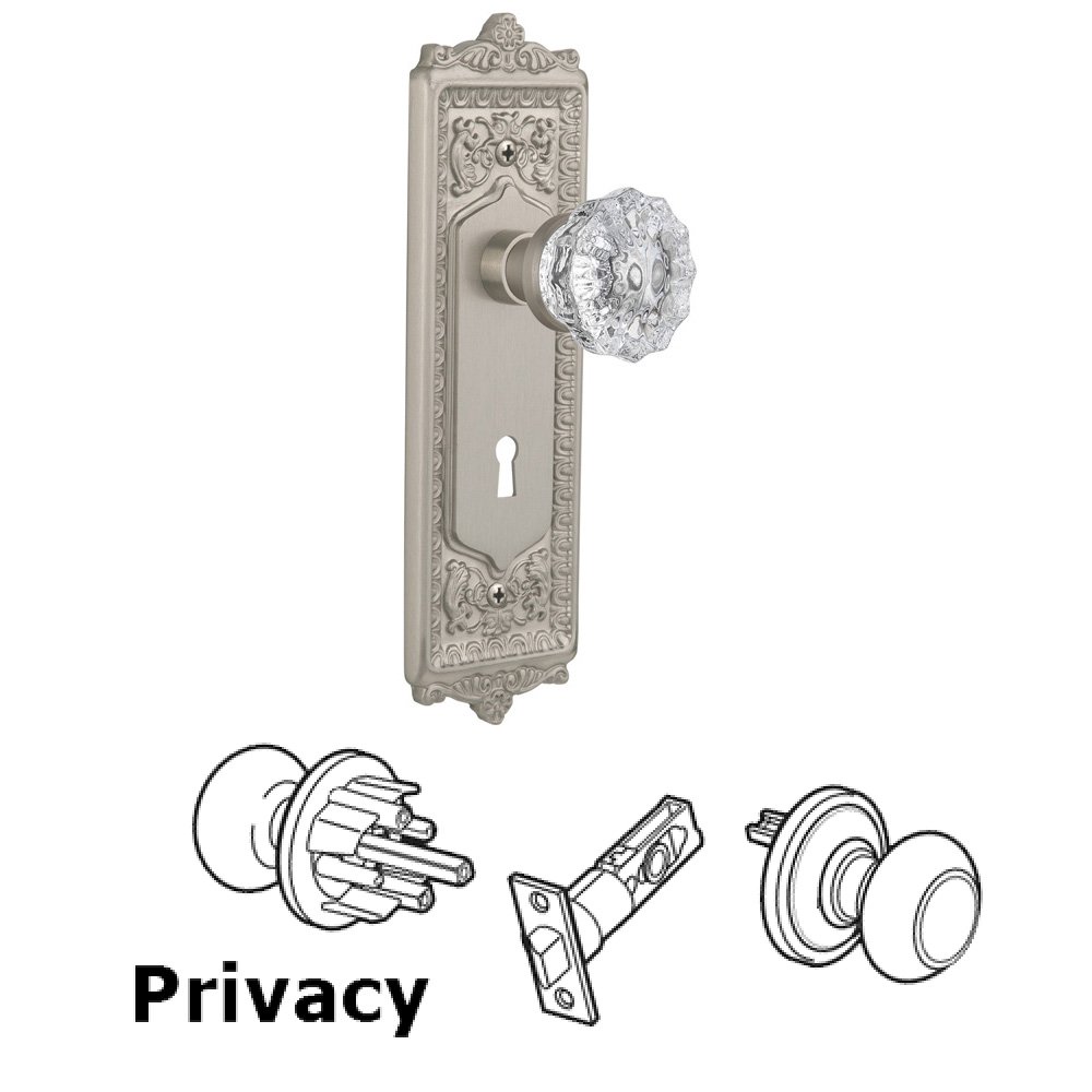Nostalgic Warehouse Privacy Egg & Dart Plate with Keyhole and Crystal Glass Door Knob in Satin Nickel