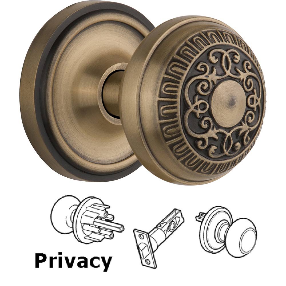 Nostalgic Warehouse Privacy Knob - Classic Rosette with Egg & Dart Door Knob in Antique Brass