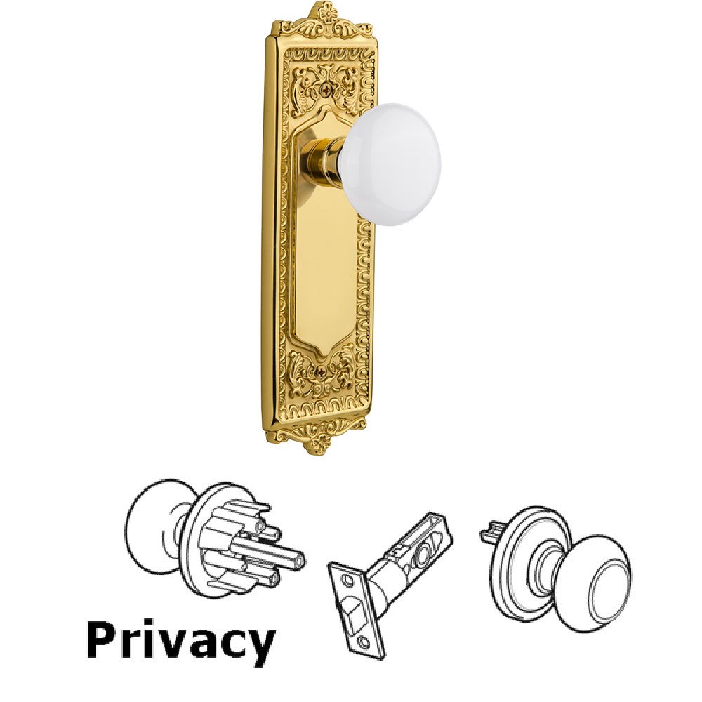 Nostalgic Warehouse Privacy Knob - Egg & Dart Plate with White Porcelain Door Knob in Polished Brass