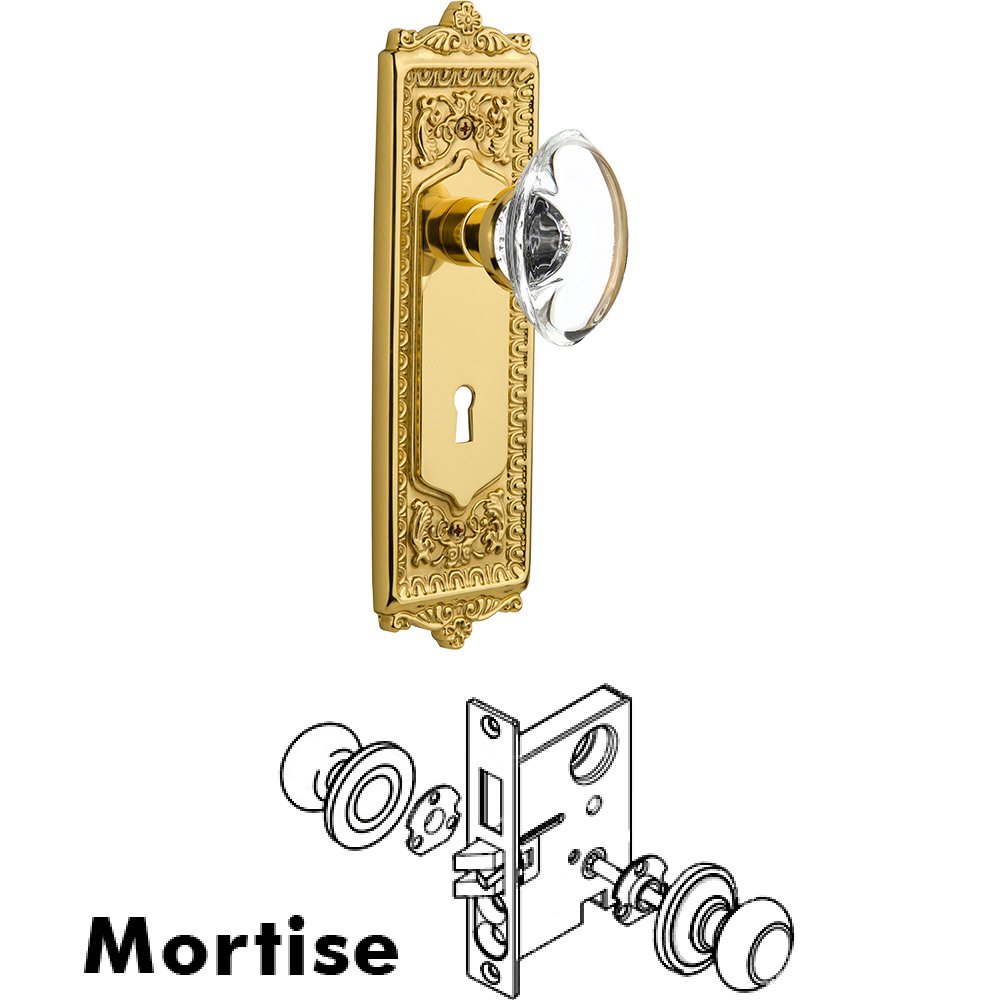 Nostalgic Warehouse Mortise Egg and Dart Plate with Oval Clear Crystal Knob and Keyhole in Unlacquered Brass