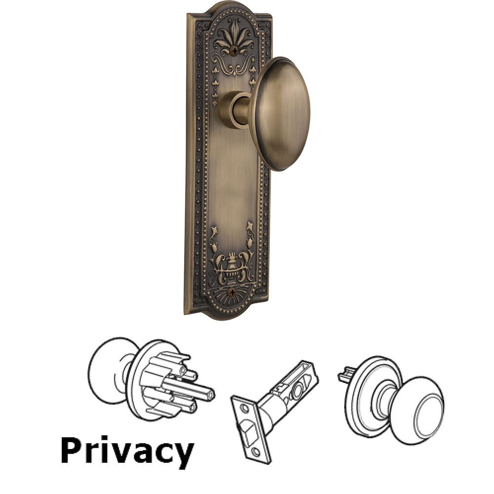 Nostalgic Warehouse Privacy Knob - Meadows Plate with Homestead Door Knob in Antique Brass
